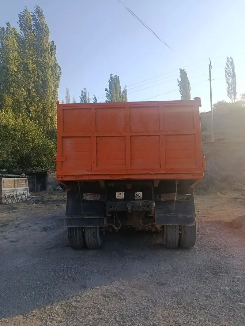 Самосвал КАМАЗ, оранжевый, колесная формула 6×4. Основные — фото 4