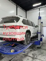 Опытный кузовщик